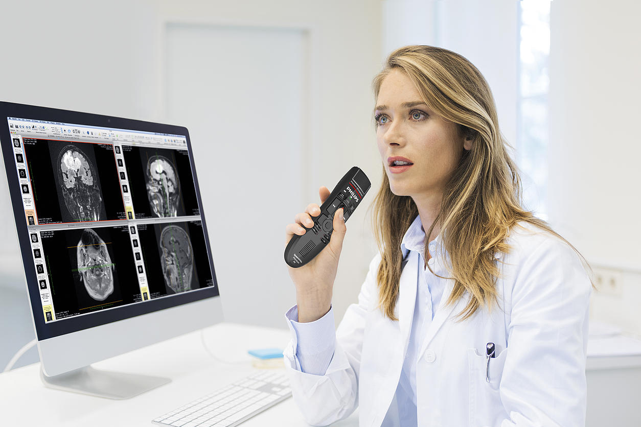 Telehealth physician speaking into wireless microphone